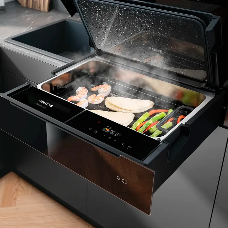 Tiroir cuisson vapeur.